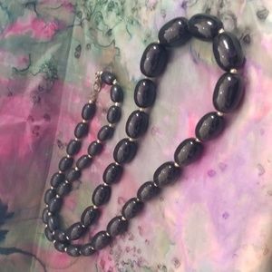 Vintage black necklace with gold accents